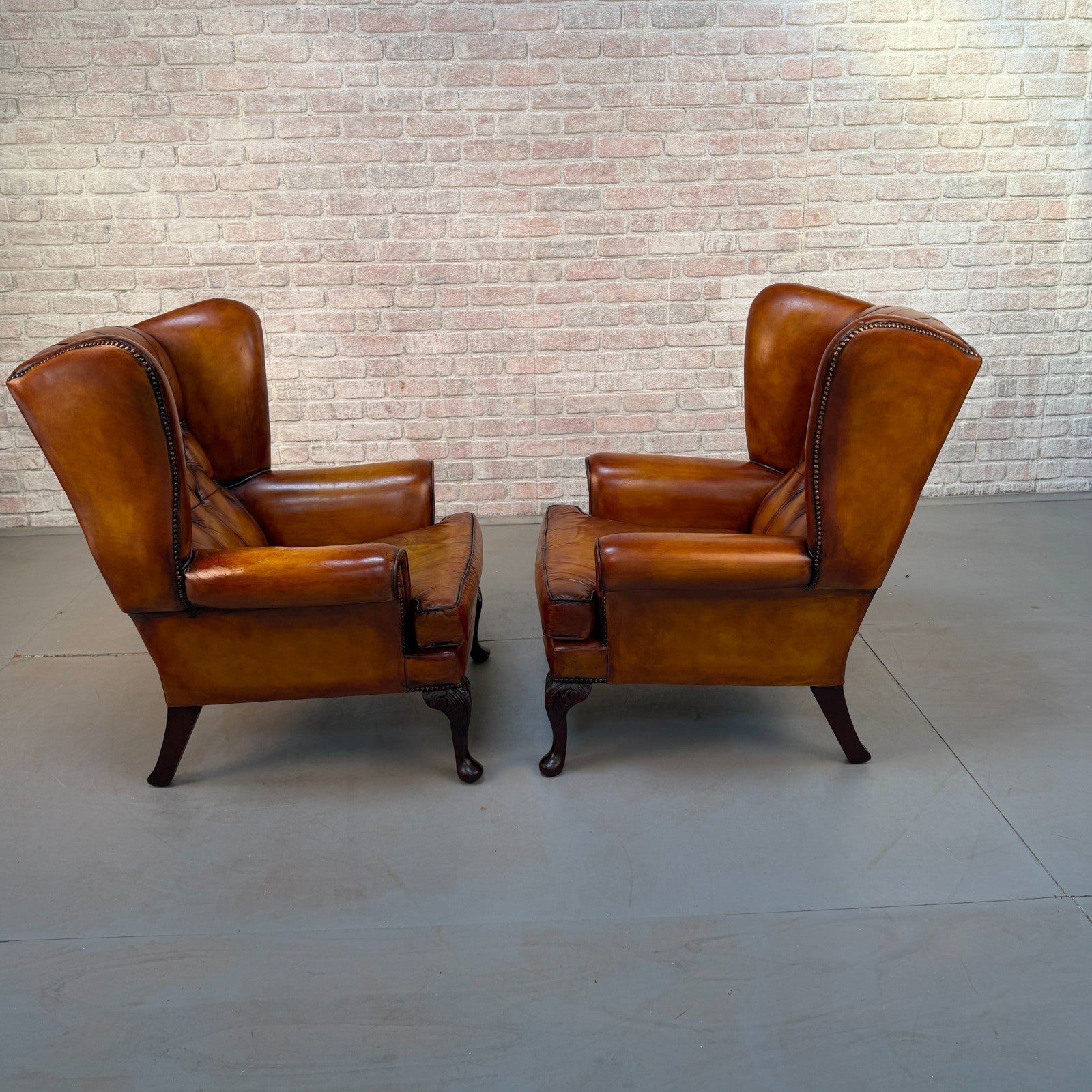 Pair of Vintage English Chesterfield Tan Hand-Dyed Leather Wingback Armchairs
