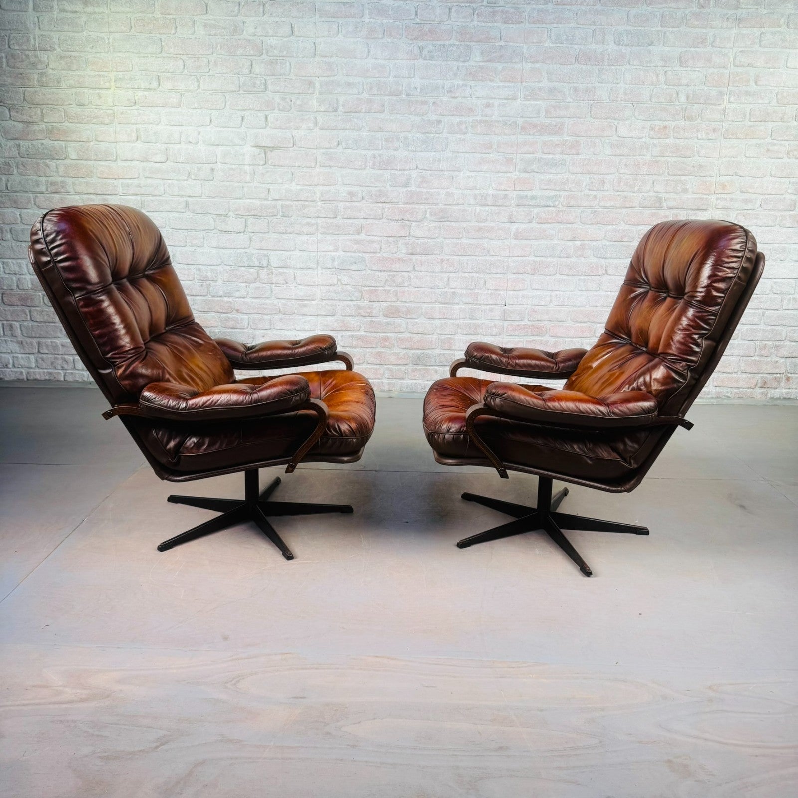 Pair of Vintage Danish Tan Leather Swivel Chairs  Stylish