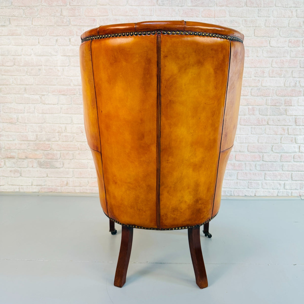 Vintage English Barrel Back Hand Dyed Tan Leather Wingback Armchair