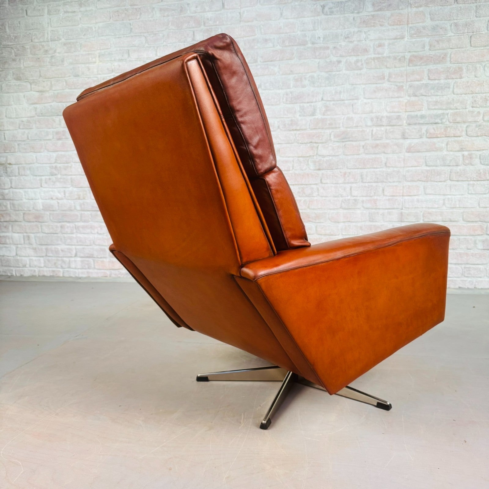 Vintage Danish Tan Leather Swivel Armchair