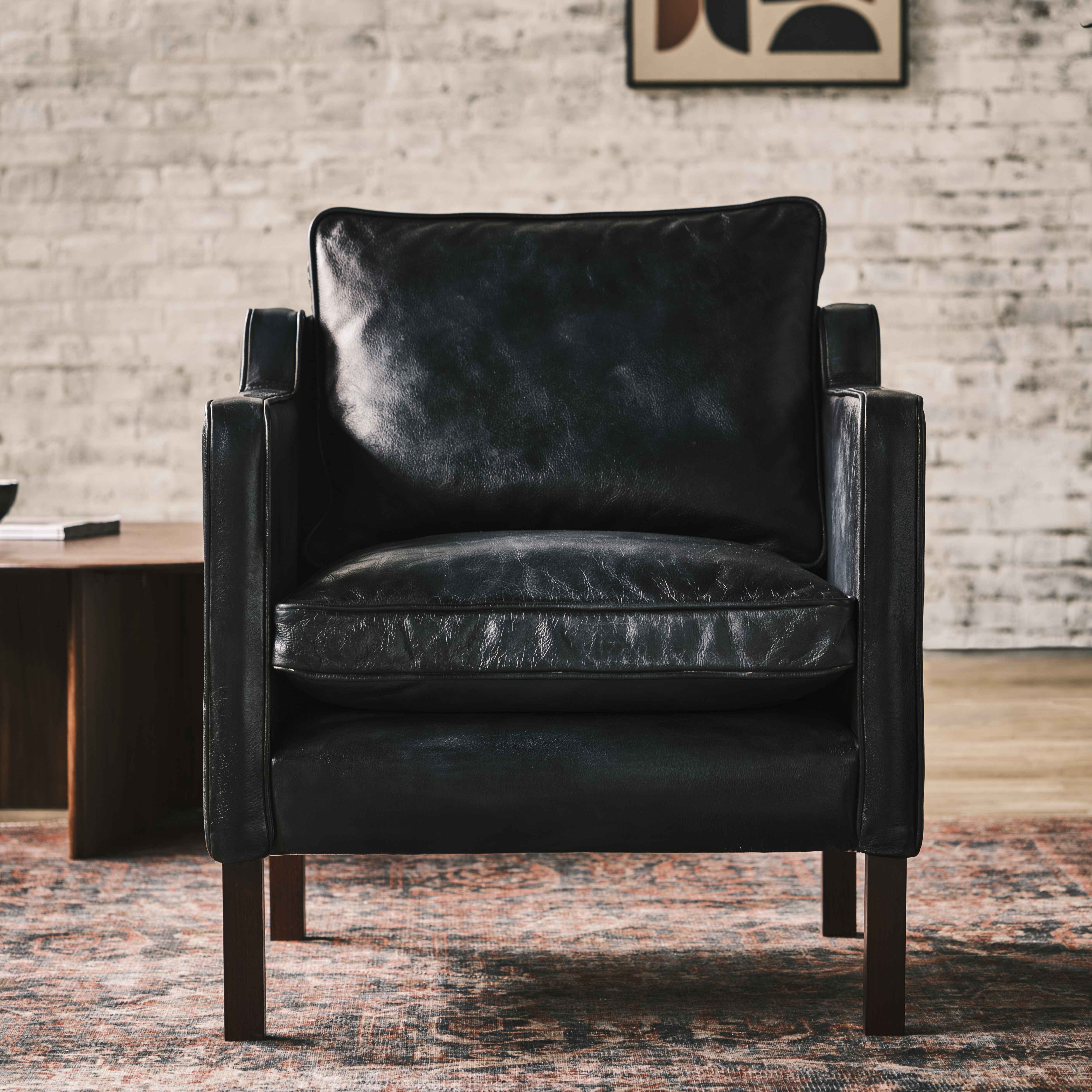 luxury-hand-dyed-mid-century-black-leather-armchair-loft-front