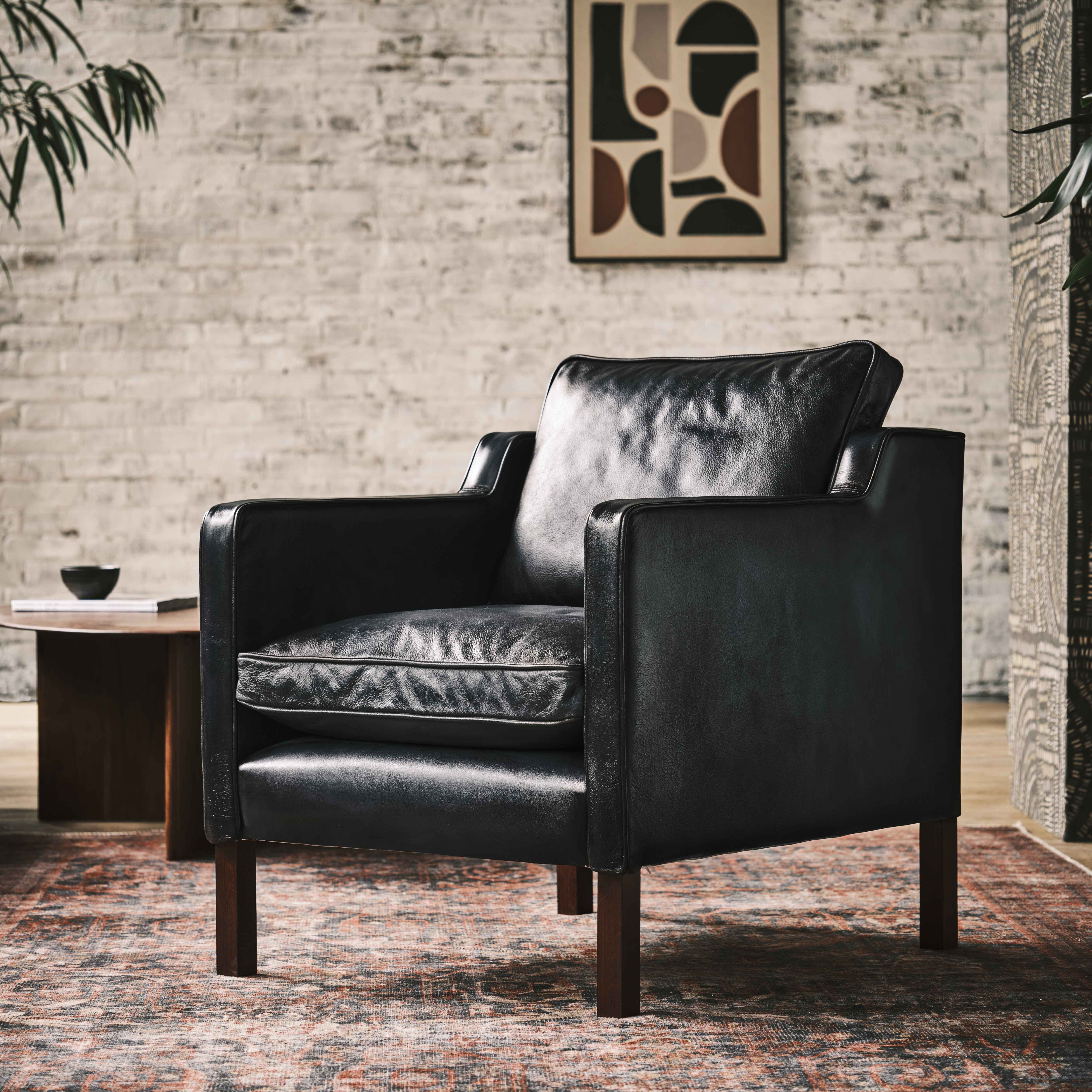 luxury-hand-dyed-mid-century-black-leather-armchair-loft-side