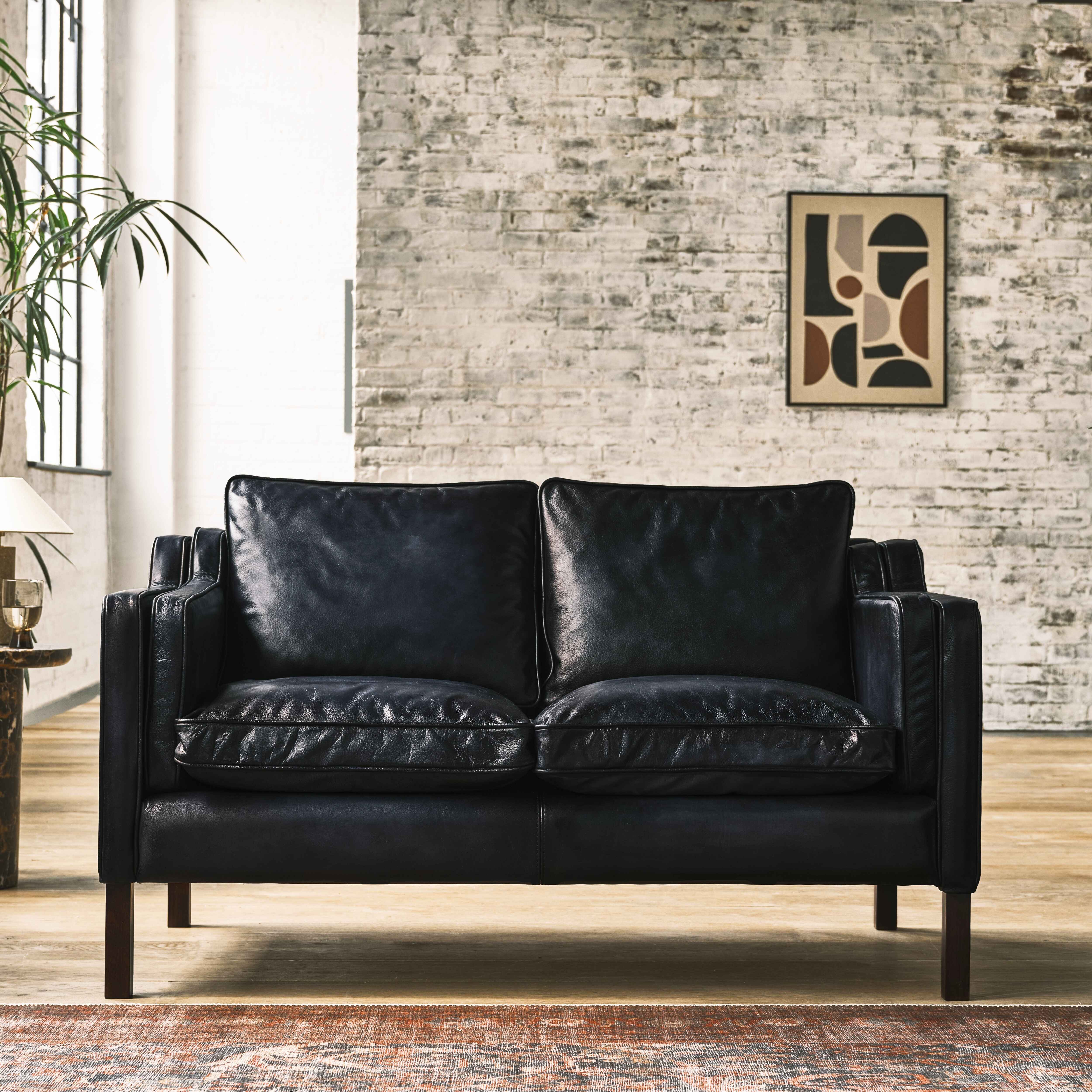 luxury-hand-dyed-mid-century-black-leather-two-seater-sofa-loft-front