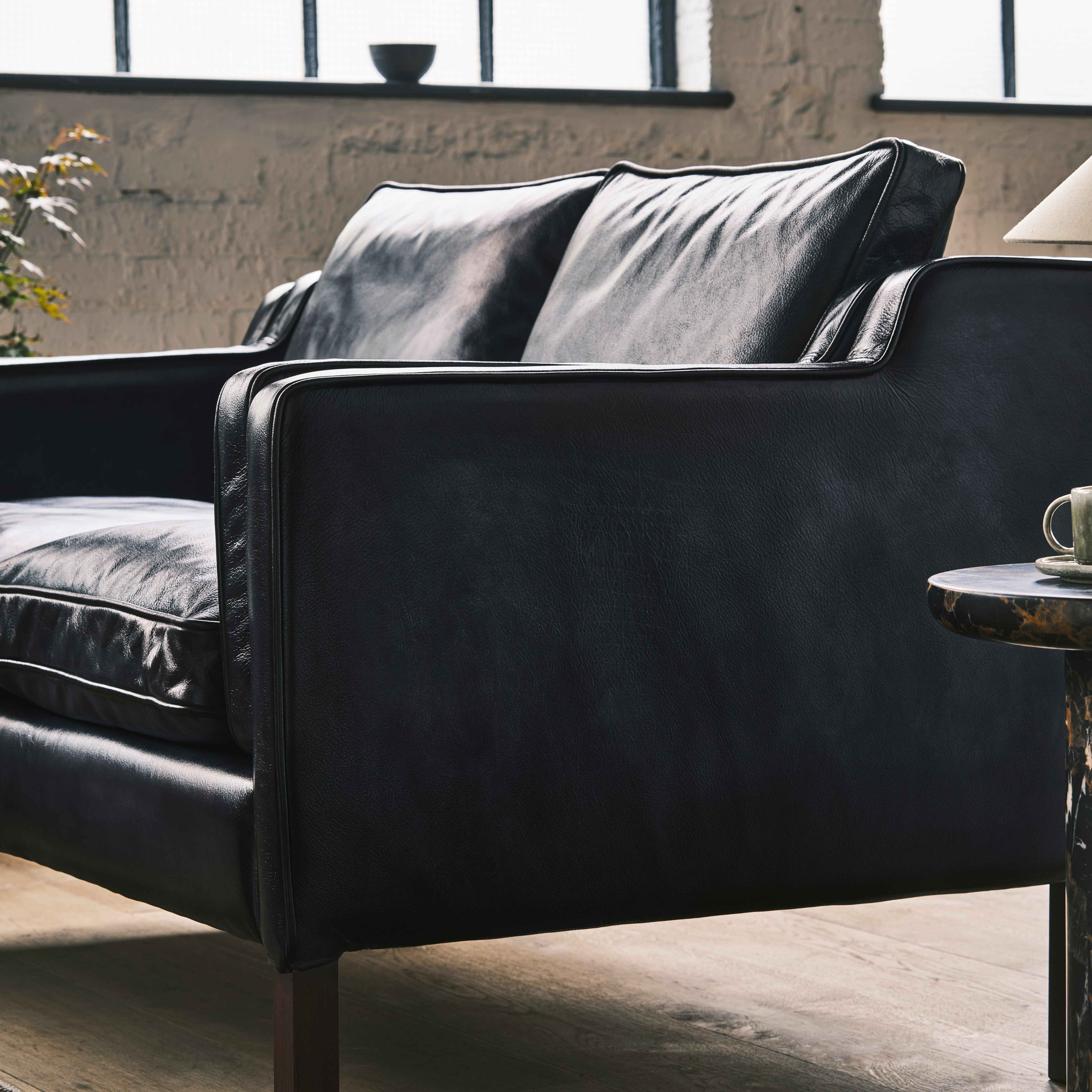 luxury-hand-dyed-mid-century-black-leather-two-seater-sofa-loft-side