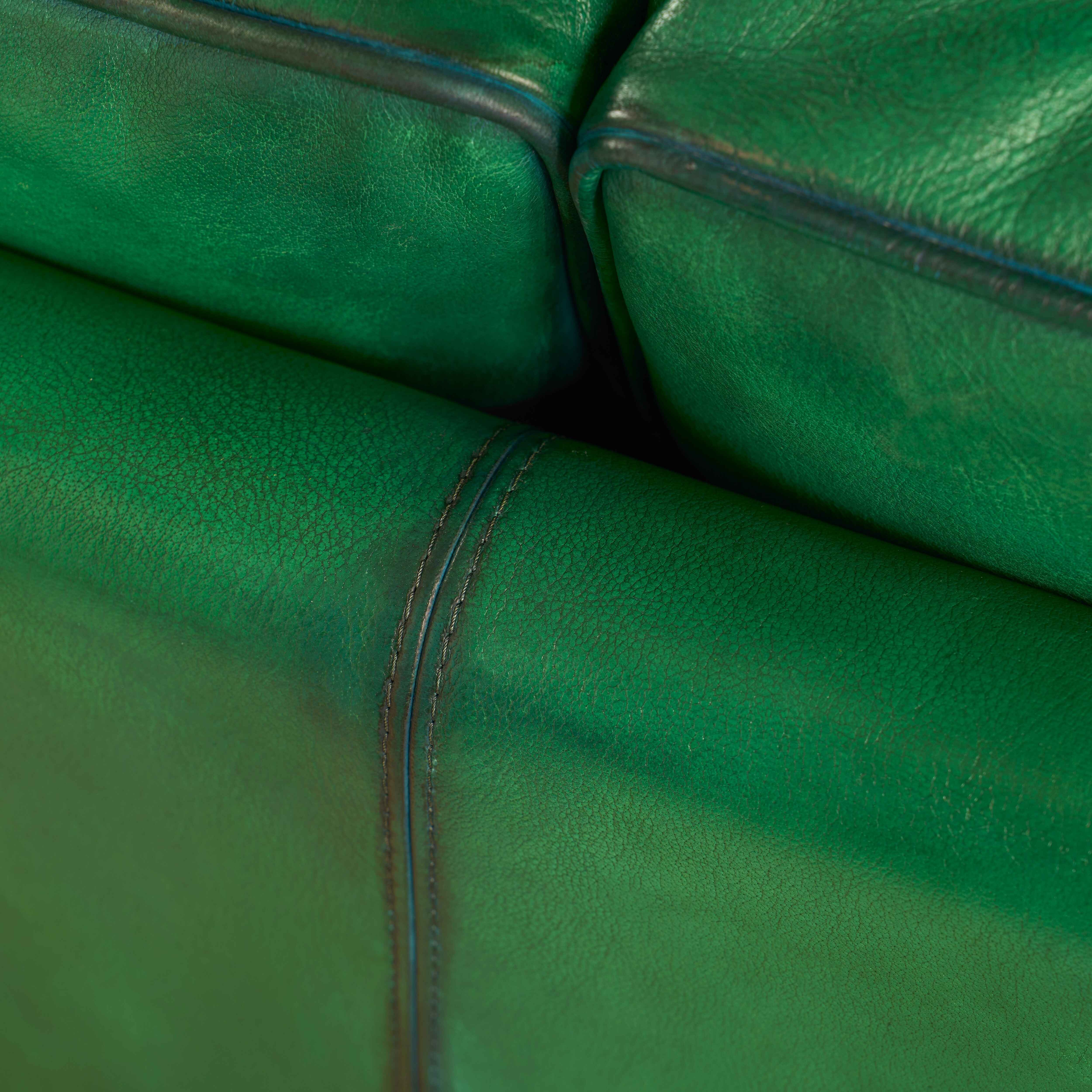 luxury-hand-dyed-mid-century-green-leather-two-seater-sofa-cottage-close-back-stitching
