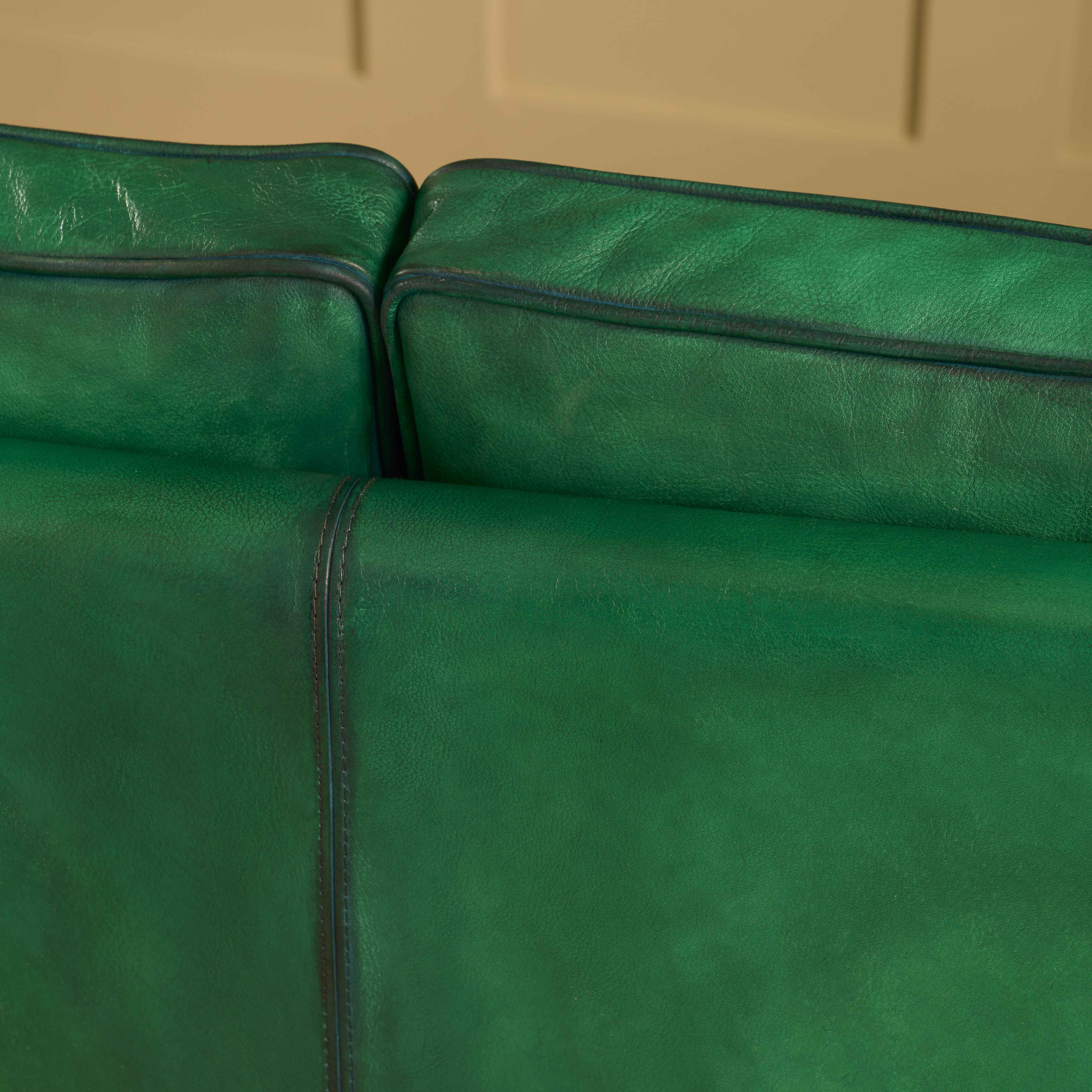 luxury-hand-dyed-mid-century-green-leather-two-seater-sofa-cottage-close-stitching-back