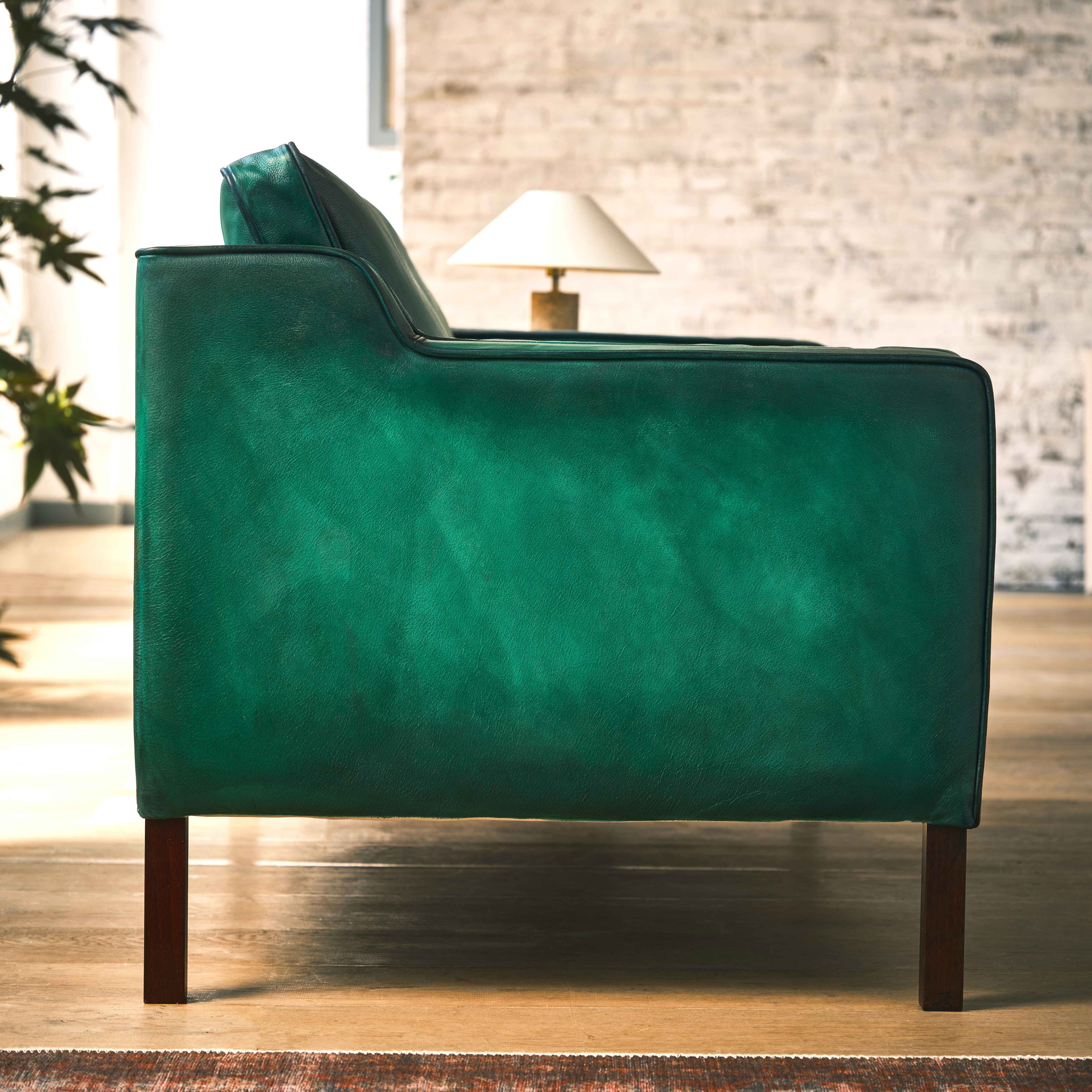 luxury-hand-dyed-mid-century-green-leather-two-seater-sofa-loft-side