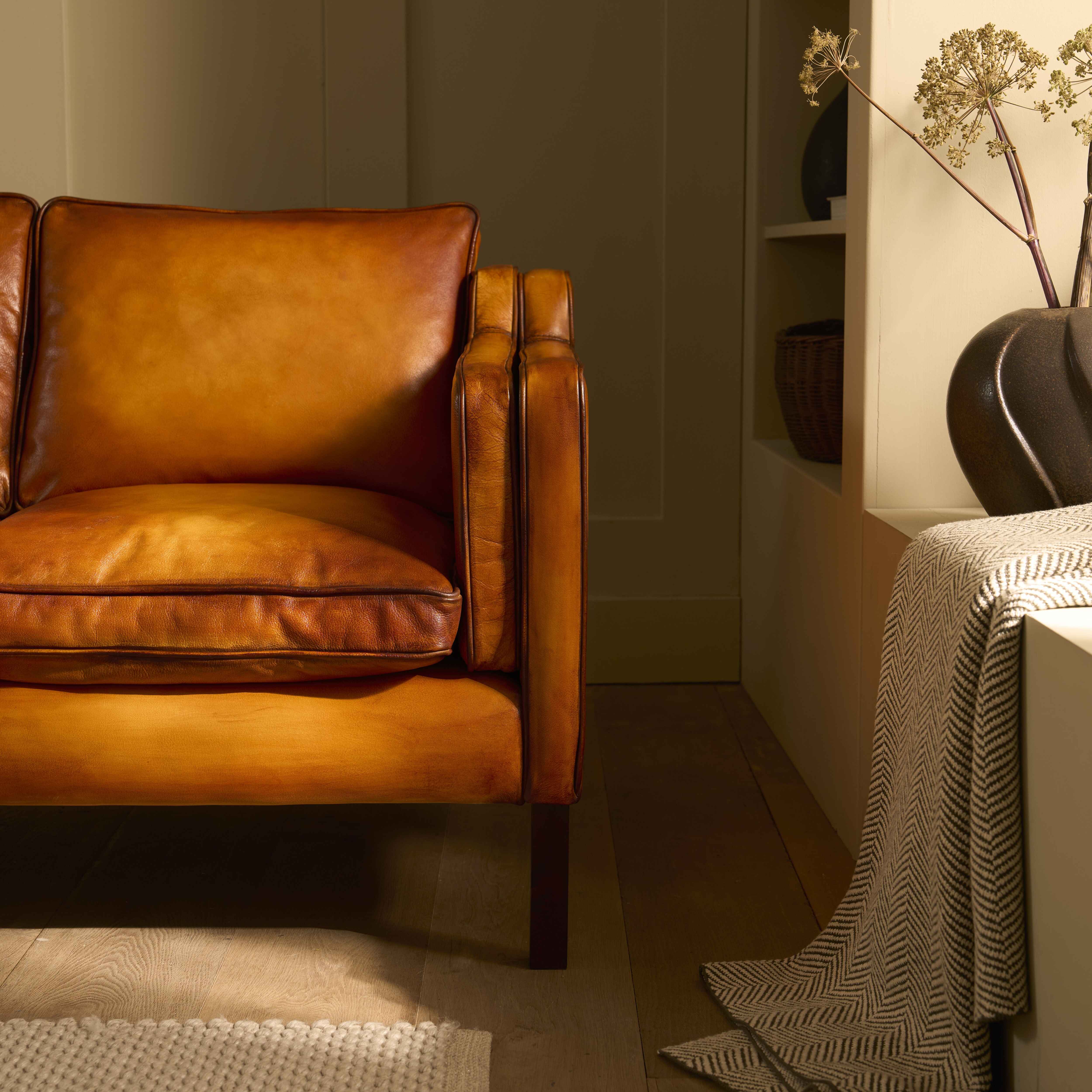 luxury-hand-dyed-mid-century-tan-leather-three-seater-sofa-cottage-front-close