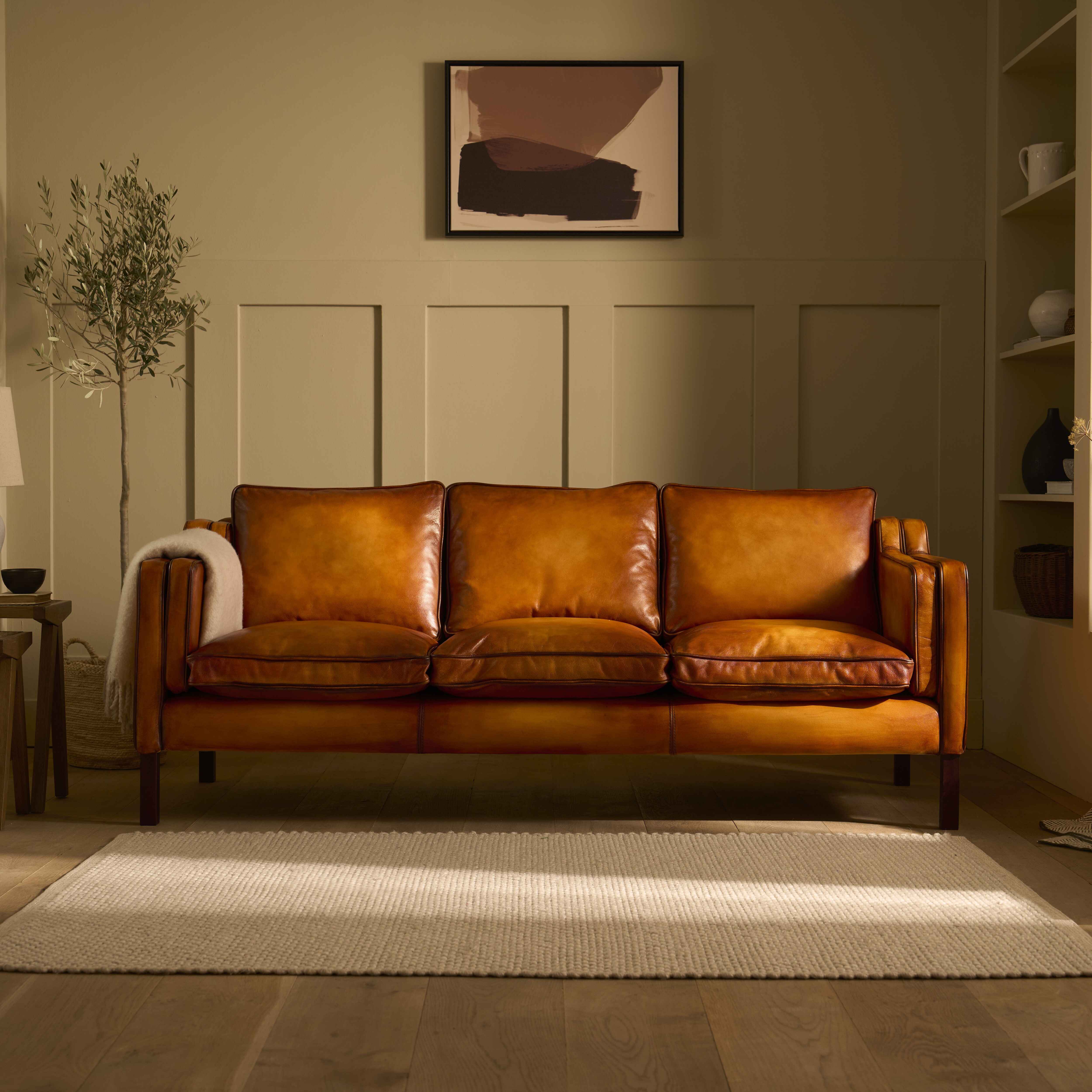 luxury-hand-dyed-mid-century-tan-leather-three-seater-sofa-cottage-front